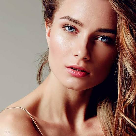 Woman with clear, luminous skin