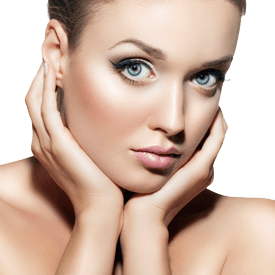 Woman with smooth, radiant skin resting hands beside her face